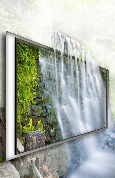 tevê - Imagem de tela de televisão com natureza e águas de uma cachoeira passando por ela..